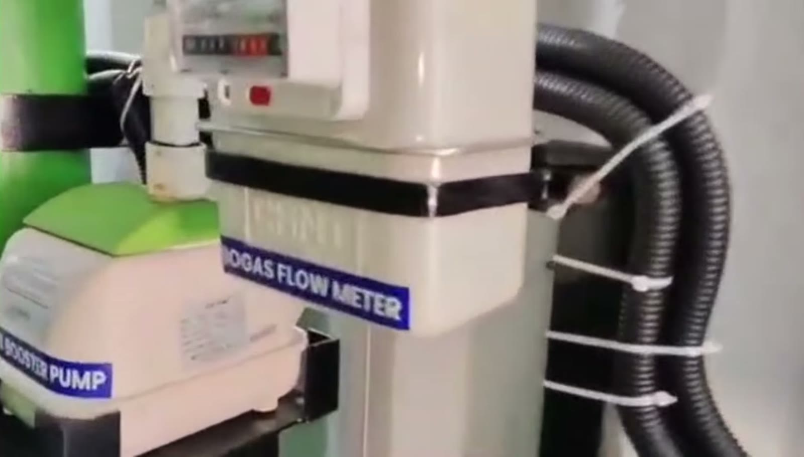Biogas flow meter and booster pump